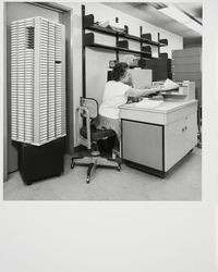 Odile Groat reproducing catalog cards from microfilm at North Bay Cooperative Library System