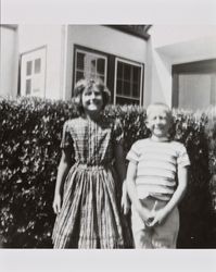 Bonnie and Bill Alwes standing in front of 815 Beaver Street, Santa Rosa, California, about 1954