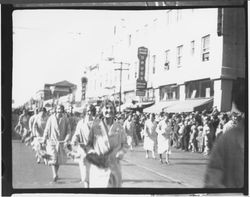 Marching units of women and girls in the Rose Parade