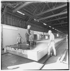 Workers completing a portable building base at Speedspace Corporation, 920 Shiloh Road, Windsor, California, 1971