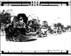 California Poppy float on Liberty Street in the Fourth of July Parade, Petaluma, California, 1910