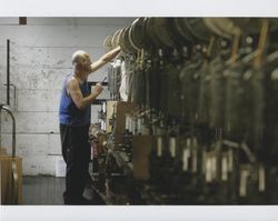 Harold Allen working on a braiding machine, Sunset Line & Twine, Petaluma, California, Dec. 2006