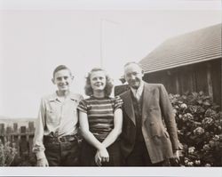 William and Mary McGregor posing for a photograph with George Dodds, circa 1946