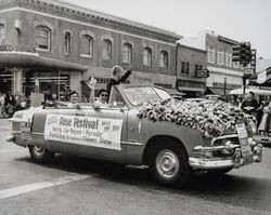 Flower covered automobile in the Rose Parade, Santa Rosa, California, 1953