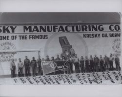 Kresky Manufacturing employees shown with their Army-Navy "E" Award