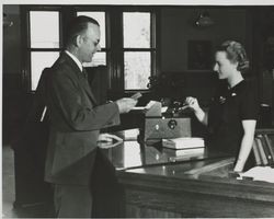 Elaine Sather and Leland Myers at the Petaluma Carnegie Library, 20 Fourth Street, Petaluma, California, December 1939