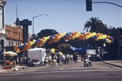 Balloon arch crossing Fourth Street as part of the California Cooperative Creamery's 80th anniversary celebration in downtown Petaluma, California, July 17, 1991