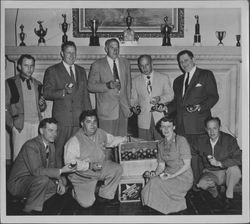 Group of people with crates of apples, Petaluma, California, 1955