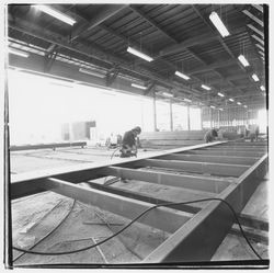 Workers construct a portable building base at Speedspace Corporation, 920 Shiloh Road, Windsor, California, 1971