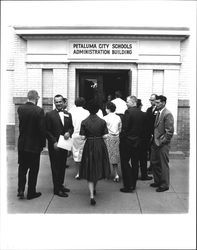 Group of people entering Petaluma City Schools Administration Building, Petaluma, California, 1955