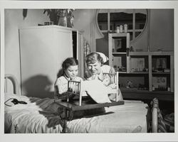 Attending to a young patient in the pediatric ward