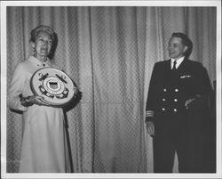 Helen Putnam receiving a plaque at graduation ceremonies at the W.S. Coast Guard Training Center, Two Rock, California, April 5, 1972