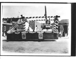 Float sponsored by Challenge Egg Food in a parade, Petaluma, California, 1935