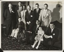 Sport figures with crippled children who participated in the charitable events of the Red Coat Organization, Santa Rosa, California, 1960