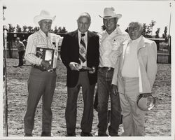 Stornetta Brothers with Fair officials receiving 1976 Dairy of the Year Award at the Sonoma County Fair, Santa Rosa, California