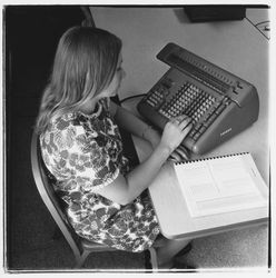 Student operating a Friden Model STW 10 calculating machine at Luther Burbank College of Commerce, Santa Rosa, California, 1971