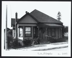 Simple Queen Anne cottage with hip roof and front and side gables