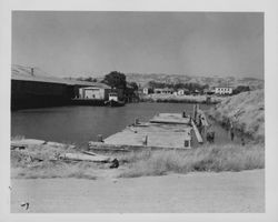 View of the head of the McNear Canal turning basin or Steamer Gold Landing, Petaluma, California, about 1955