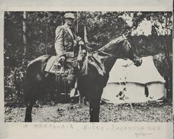 Jack London riding Belle at his camp