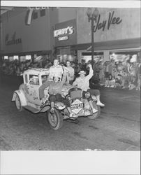 Car representing Minatta Trucking Service in the Fourth of July parade, Petaluma, California, 1955