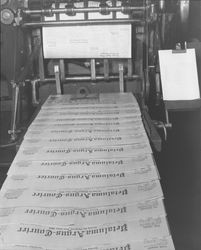 Copies of the Petaluma Argus-Courier coming off the press, Petaluma, California, August 26, 1957