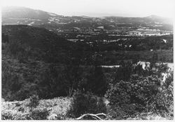 Unidentified view of Sonoma County from atop hills, looking into a valley