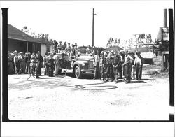 Group of people with Two Rock fire truck, Two Rock, California, about 1950