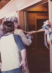 Mayor Helen Putnam cutting the ribbon at the dedication of the Petaluma Public Library