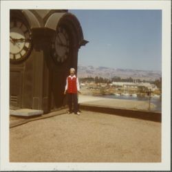 Helen Putnam standing next to the town clock, Petaluma, California, May, 1973