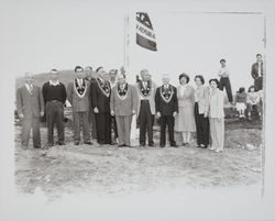 Native Sons of the Golden West by a flagpole in Bodega Bay, California, Sept. 19, 1947