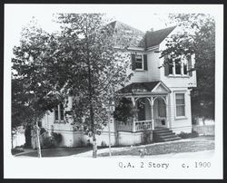 Simple Queen Anne residence with distinctive front porch