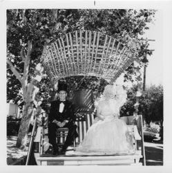 Lorris I. and Ilah M. Dillingham riding on a float in the Centennial Parade, Petaluma, California, July 4, 1976