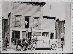 G.F. Proctor and his team of horses in front of the Russian River Flag building