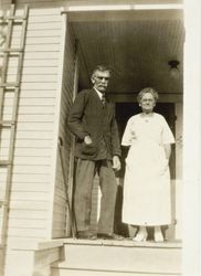 Andrew and Eliza Donogh on the steps of Joe Donogh's house in Hayward, California, about 1915