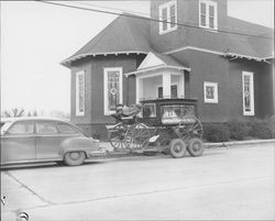 Old hearse in front of Christian Church, Petaluma, California, 1952