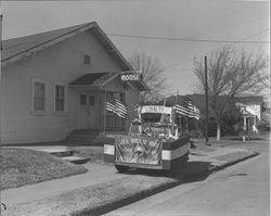 Car decorated with ribbons, flags and the Moose emblem, Petaluma, California, about 1963