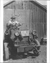 John B. Musso at the helm of his garbage truck on Erwin Street, Petaluma, California, 1926