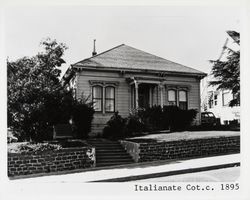 Italianate Cottage with hip roof, bracketed cornice and dentil roof trim