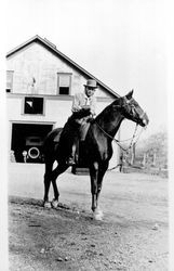 Clarence Martin on his horse, Geyserville, California, about 1928