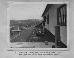 Men working on the roof of the Poultry Producers of Central California mill under construction, Petaluma, California, about 1938