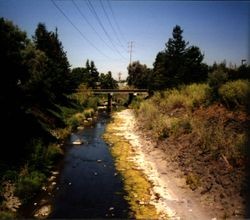 Looking west along Santa Rosa Creek from Olive Street - Railroad Avenue Bridge