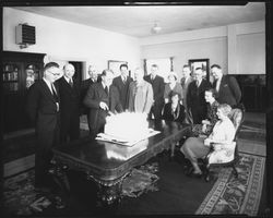 Ernest Finley cutting the cake