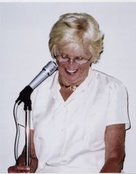 Beverly C. Wilson at the microphone at the Sonoma-Marin Fair, Petaluma, California, 1980s