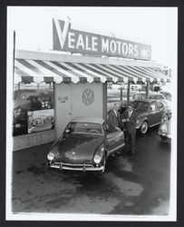 Dick From taking delivery of the first Ghia convertible from Darrold Parks, Santa Rosa, California, 1958