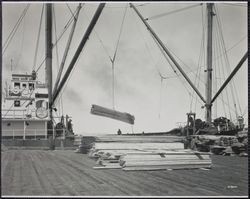 Unloading lumber from the SS Robert Johnson, 41 The Embarcadero, San Francisco, California, 1920s