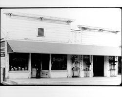 Obed E. Bosworth standing in the doorway of Bosworth's General Merchandise