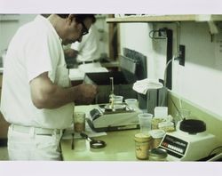 John Matteri working in the lab at the California Cooperative Creamery on Western Avenue, Petaluma, California