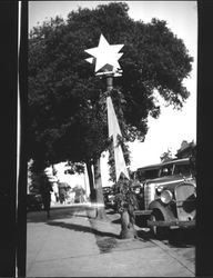 Christmas star decorating a light pole, Petaluma, California, about 1932