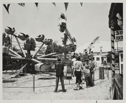 Carnival rides observation at the Sonoma County Fair, Santa Rosa, California, July 25, 1957