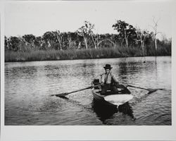 Man in rowboat on Lake Jonive